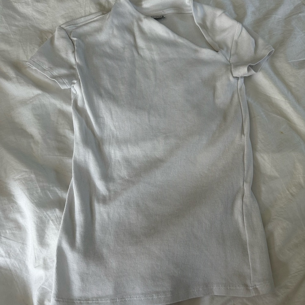White asymmetrical cut neckline small top